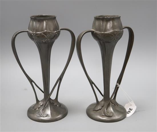 Archibald Knox for Liberty & Co., a pair of Tudric pewter vases, no. 029 H.25cm